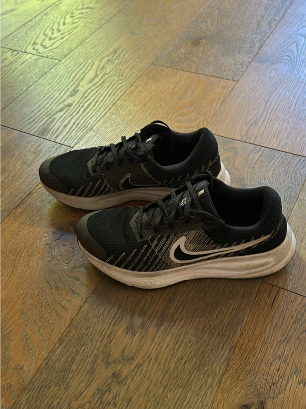 Nike Men’s Run Defy Black and White Athletic Running Shoes